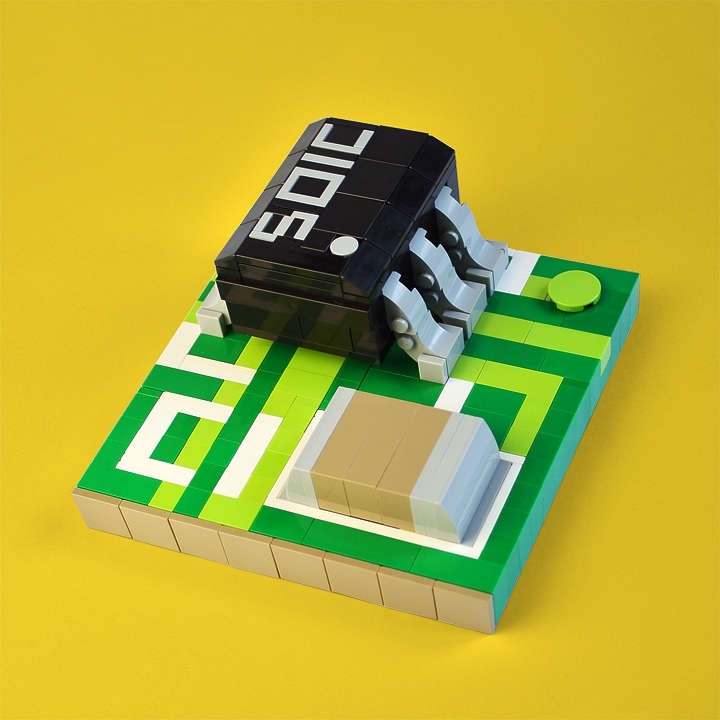 LEGO MOC - 16x16: Technics - Microchip: <p align=left></i>                 Фрагмент двуслойной печатной платы в масштабе 20:1, на которой находится шестивыводная микросхема и чип-конденсатор. Плата покрыта защитной маской зеленого цвета, поверх методом шелкографии нанесена маркировка.