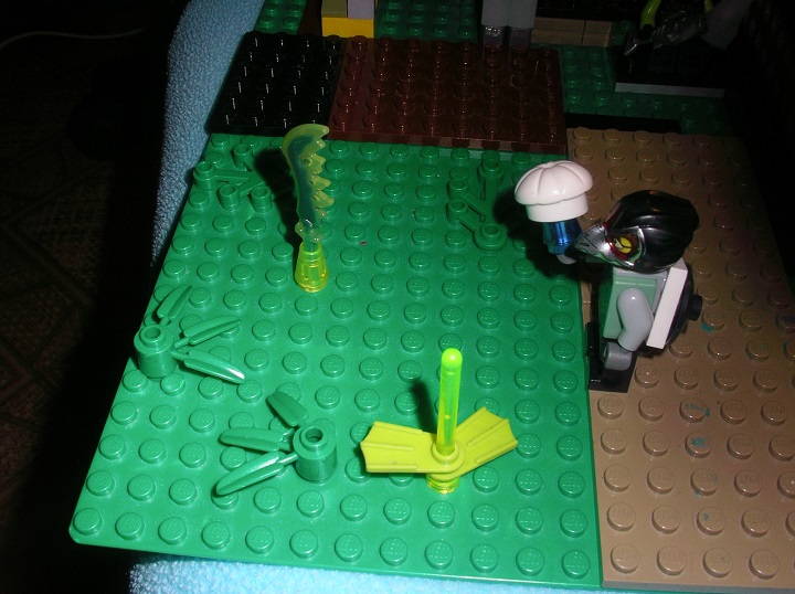 LEGO MOC - Инопланетная жизнь - Планета Макануйя: Один инопланетянин поймал в 'пруду' пронакулю-рыбу.