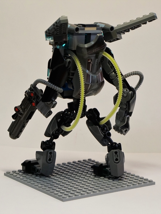 LEGO MOC - 16x16: Mech - Paratrooper - десантный мех: Для осуществления небольшого перелета, подобно кузнечику, через трубки из Легония в ноги передается огромный импульс накопленный в реактивных двигателях.